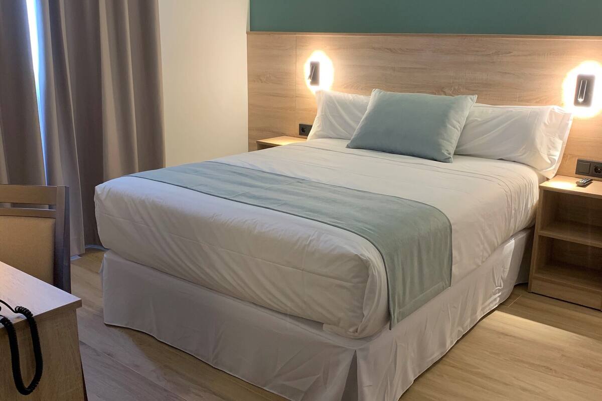 down duvets, minibar, desk, blackout curtains