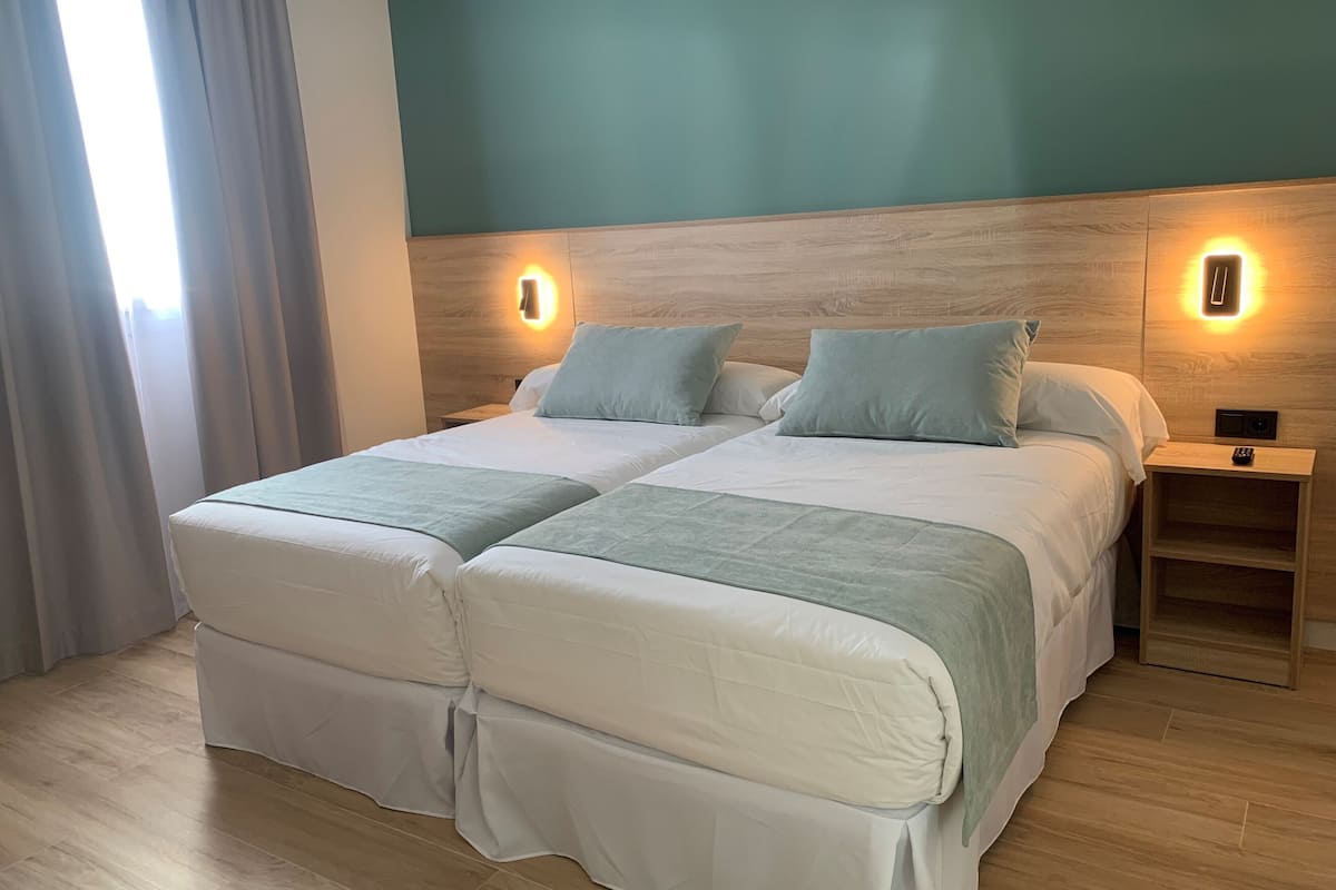 down duvets, minibar, desk, blackout curtains