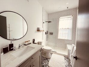 Shower, hair dryer, towels, soap