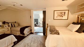 2 bedrooms, desk, iron/ironing board, travel crib