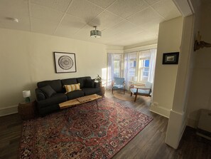 Comfort Apartment | Living area | Flat-screen TV - 71 North Winooski Ave. (Burlington)
