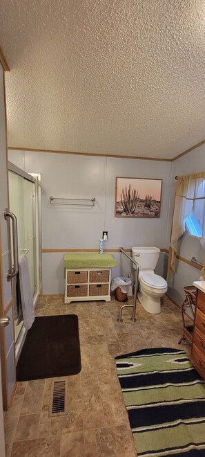 Bathtub, hair dryer, towels, soap