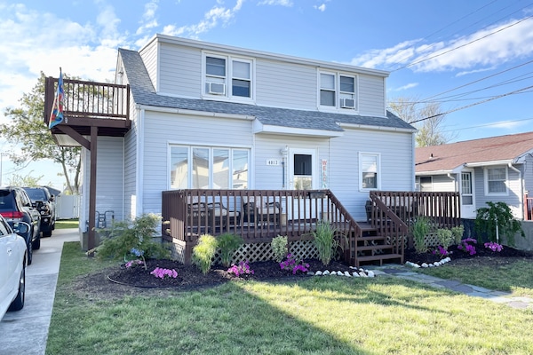 One bedroom is a separate entrance up the stairs on the left side of the house.