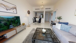 Appartement Confort | Coin séjour | TV connectée