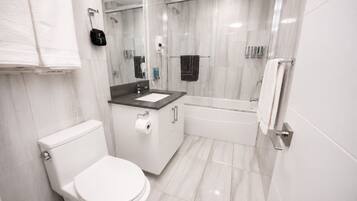 Hair dryer, towels, soap, shampoo
