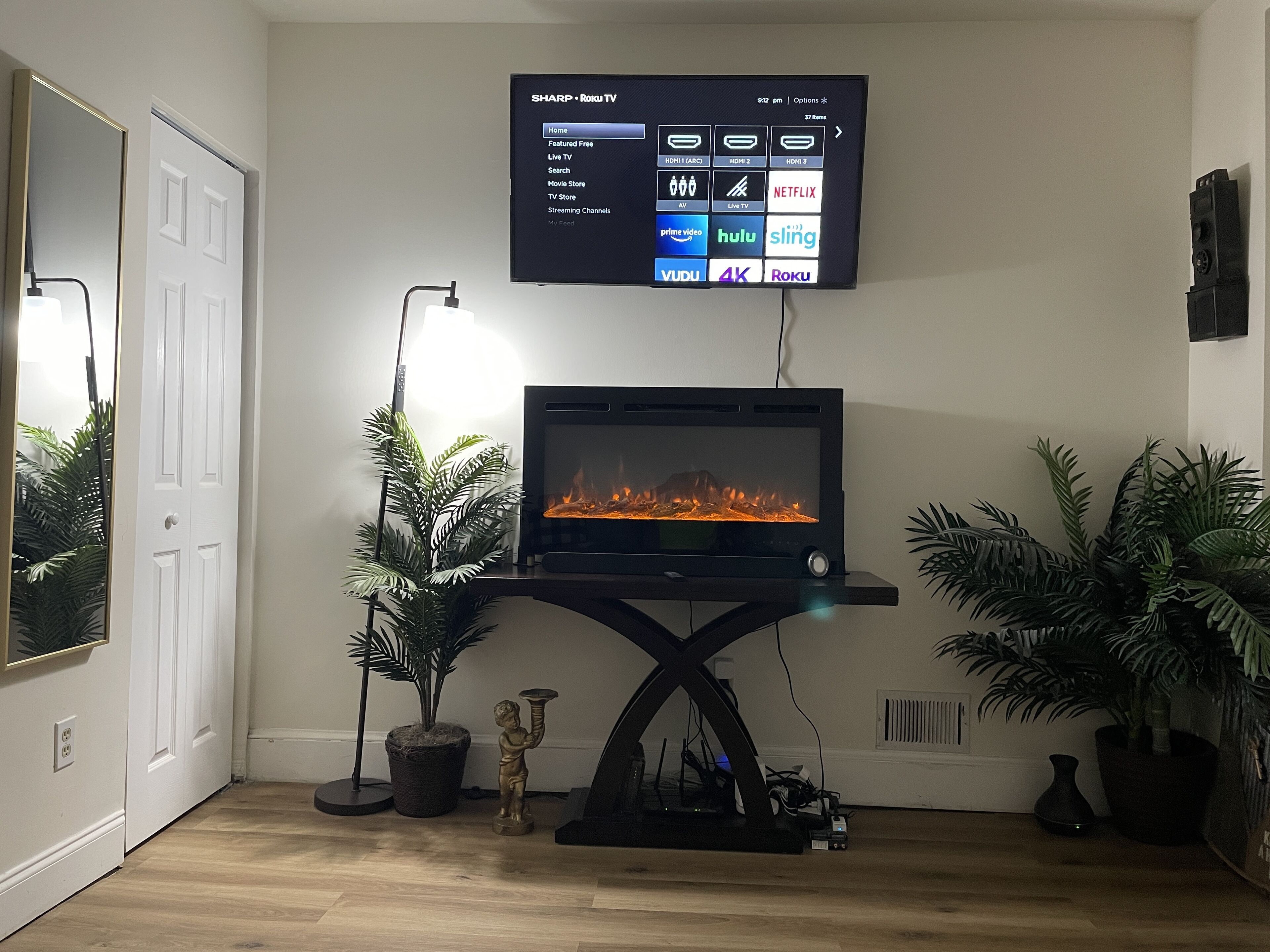 Deluxe Apartment | Living area | 55-inch LED TV with digital channels, TV, fireplace