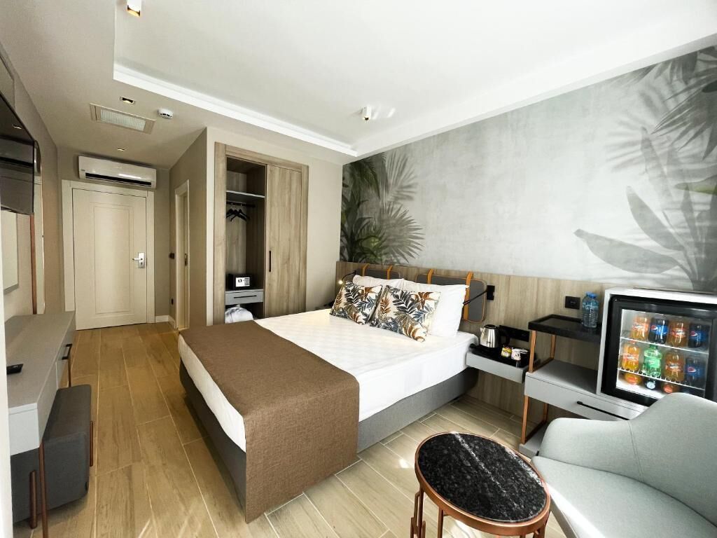 Premium bedding, Select Comfort beds, free minibar items, in-room safe