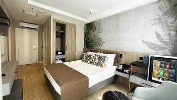 Premium bedding, Select Comfort beds, free minibar items, in-room safe