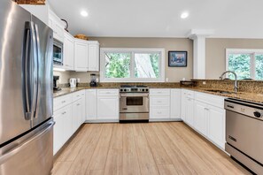 House, Multiple Beds, Pool Access, Pool View (16 Turnberry Lane) | Private kitchen | Fridge, microwave, oven, stovetop
