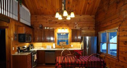 Lazy Moose Log Cabin w/ hot tub, fireplace & lake