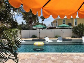 Outdoor pool, a heated pool - Luxury Beach Cottage | Walk to Dining & Sunset (Indian Rocks Beach)
