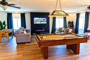 Smart TV, fireplace, video games, table football