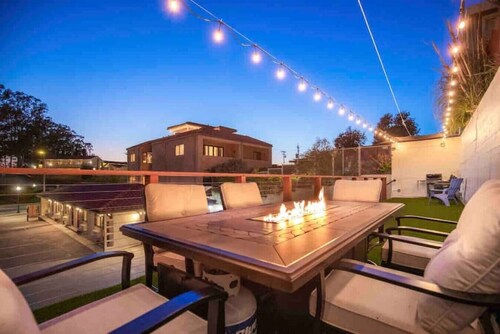 WOW! Gated 5-Suite Coastal Retreat @ Main Beach