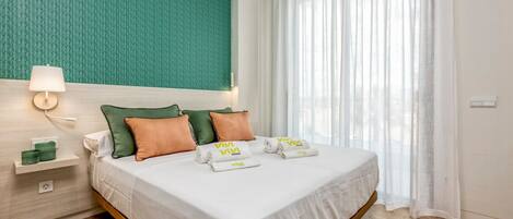 2 dormitorios, caja fuerte, tabla de planchar con plancha y wifi gratis