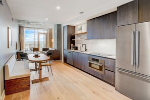 Fridge, microwave, oven, stovetop - 30th-floor Historic Rainey St condo with lakeview balcony - dog-friendly (Austin)
