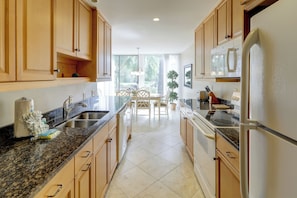 Villa, Multiple Beds, Kitchen, Pool View (1252 Harbour Town Club) | Private kitchen | Fridge, microwave, oven, stovetop