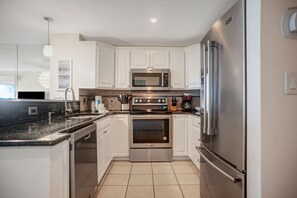 Villa, Multiple Beds, Kitchen (1829 Beachside Tennis) | Private kitchen | Fridge, microwave, oven, stovetop