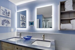 Shower, rainfall showerhead, hair dryer, towels