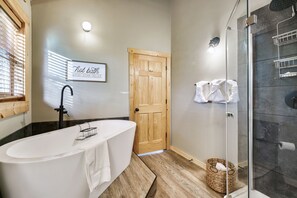 Combined shower/tub, hair dryer, towels, soap