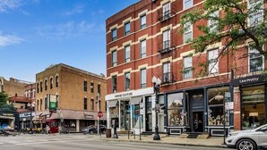 A street view with a building labeled "Winnie Couture" and another with "Live Pretty." - Lovely 4 Bedroom Spot located in Charming Old Town (Chicago)