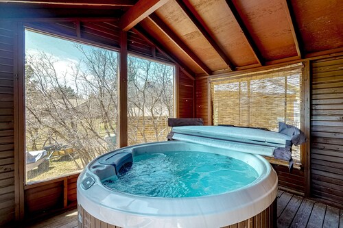 Dog-friendly home with indoor hot tub, fireplace, great views & pool access