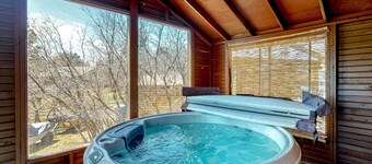 Dog-friendly home with indoor hot tub, fireplace, great views & pool access