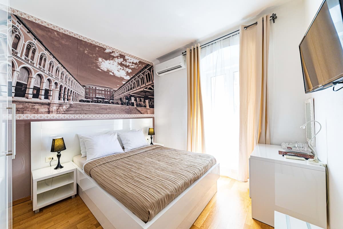 Chambre Deluxe | Literie de qualité supérieure, matelas Select Comfort, minibar