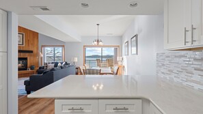 TV, fireplace, books