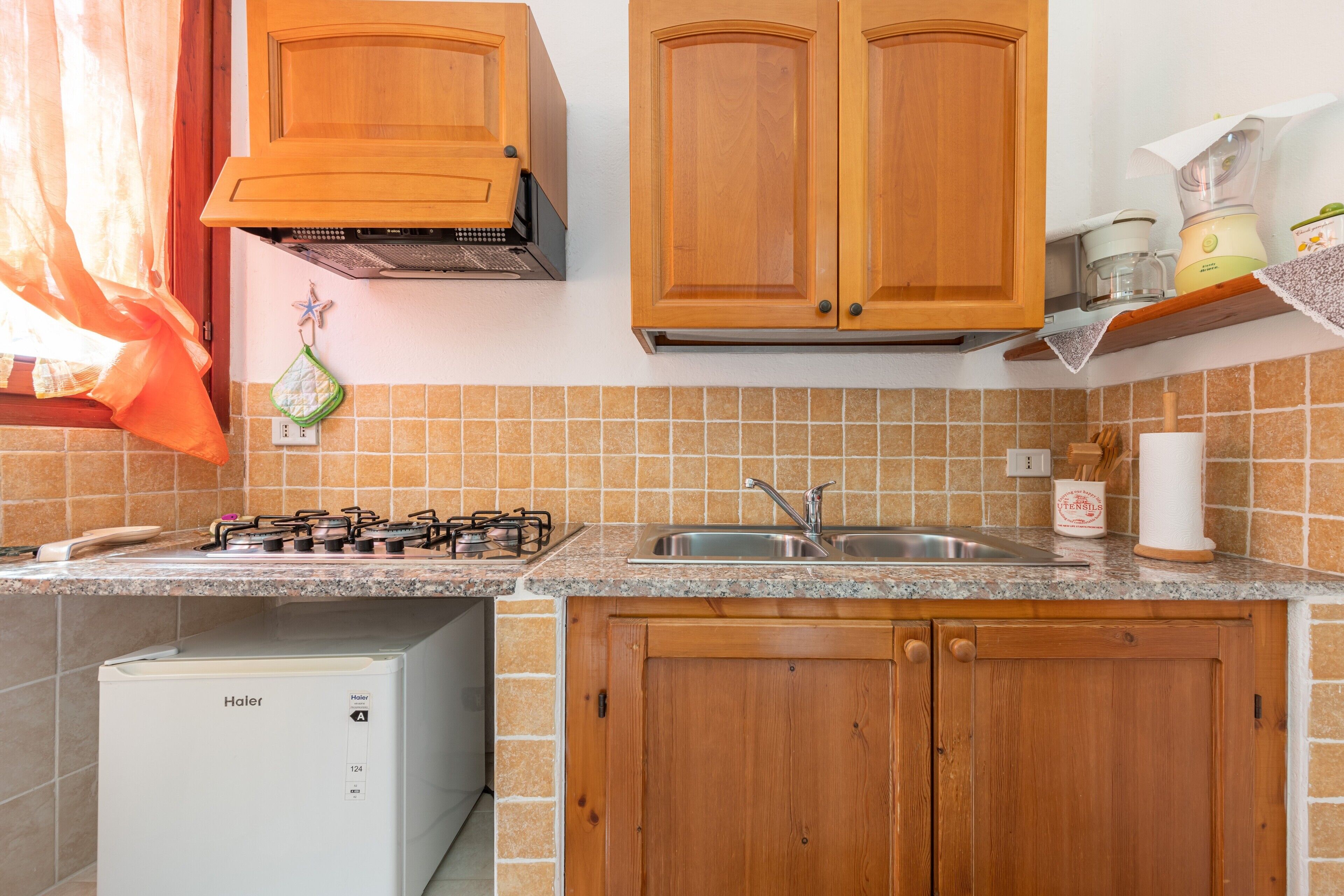 Fridge, stovetop, coffee/tea maker, toaster