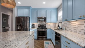 Réfrigérateur, four, plaque de cuisson, lave-vaisselle