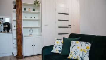 Apartamento Deluxe | Zona de estar