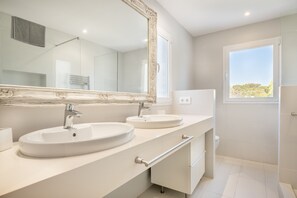 Bathtub, hair dryer, towels