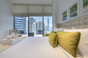 2 chambres, coffres-forts dans les chambres, fer et planche Ă repasser