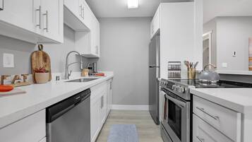 Condo, 2 Bedrooms | Private kitchen | Fridge, oven, coffee/tea maker, toaster