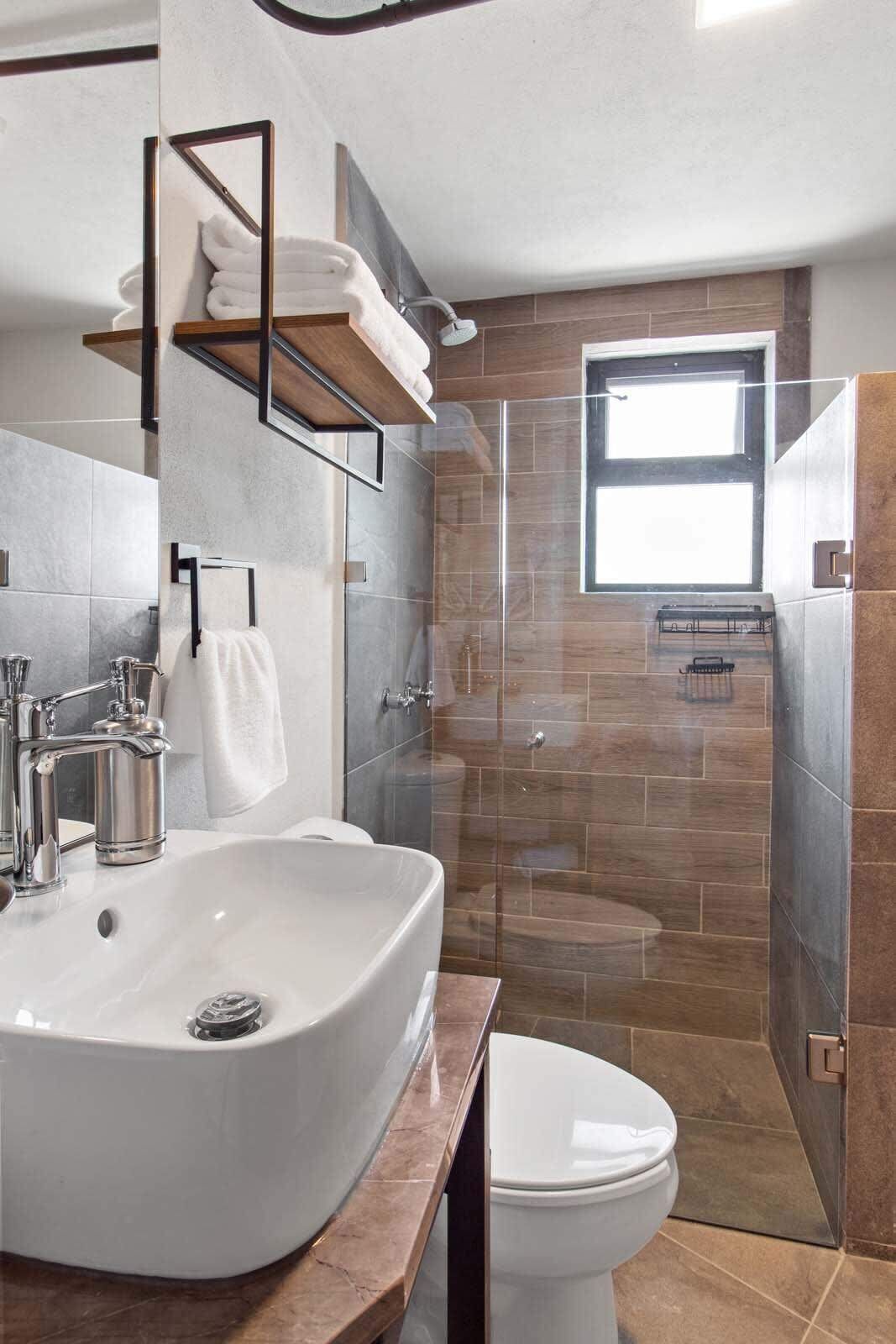 Shower, hair dryer, towels