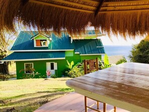 Outdoor dining - 7th Heaven Kitchen & Cottage + Loft authentic Living & Cuisine @ Anse L'Ivronge (Delcer CHOISEUL)