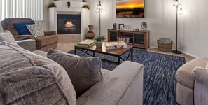 Televisio, takka, työhuone