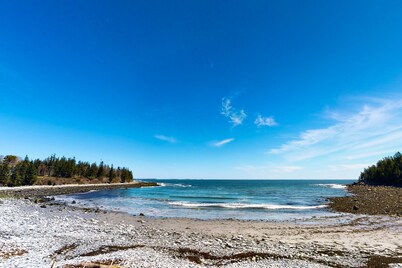 Tranquil getaway on the coast with beach access, ocean views, & screened porch