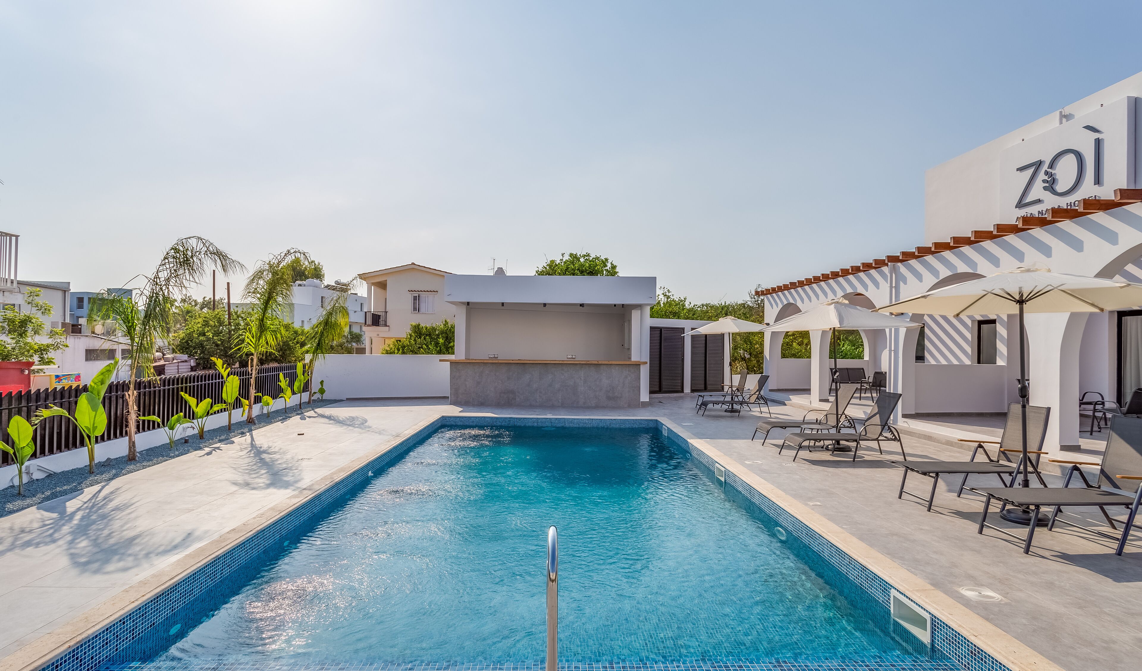 outdoor pool, pool loungers