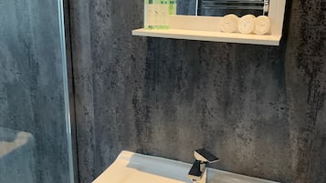 Combined shower/tub, hair dryer, towels, soap