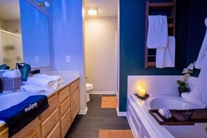 Combined shower/tub, jetted tub
