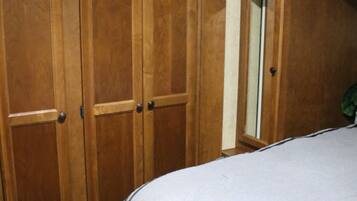 1 bedroom, desk, iron/ironing board, travel crib