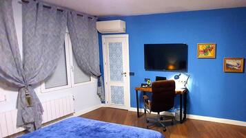 1 dormitorio, tabla de planchar con plancha, Internet y ropa de cama