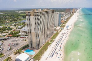 On the beach, sun loungers, beach towels