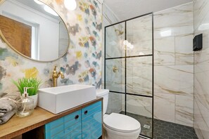 Combined shower/tub, hair dryer, towels, soap
