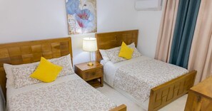 Family Double Room | Pillowtop beds, individually decorated, free WiFi, bed sheets - Hotel Juliana (Nagua)