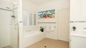 Bathtub, hair dryer, towels