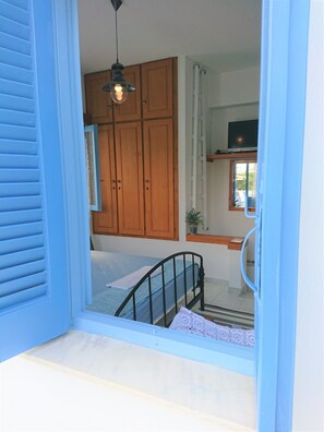 1 غرفة نوم ومكواة/لوح كي وخدمة الإنترنت وملاءات أسرّة