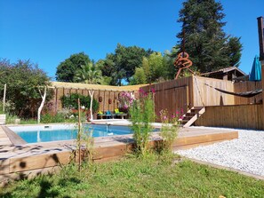 Alberca al aire libre y alberca climatizada