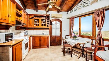 Traditional House, 2 Bedrooms, Mountainside | Living area | 32-inch flat-screen TV with cable channels, TV, fireplace